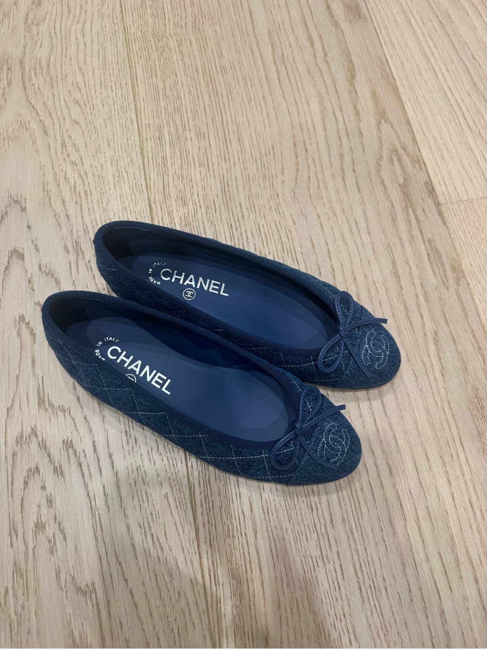 CHANEL Denim Quilted Ballet Flats in denim with CC Medallion. Worn 3 times